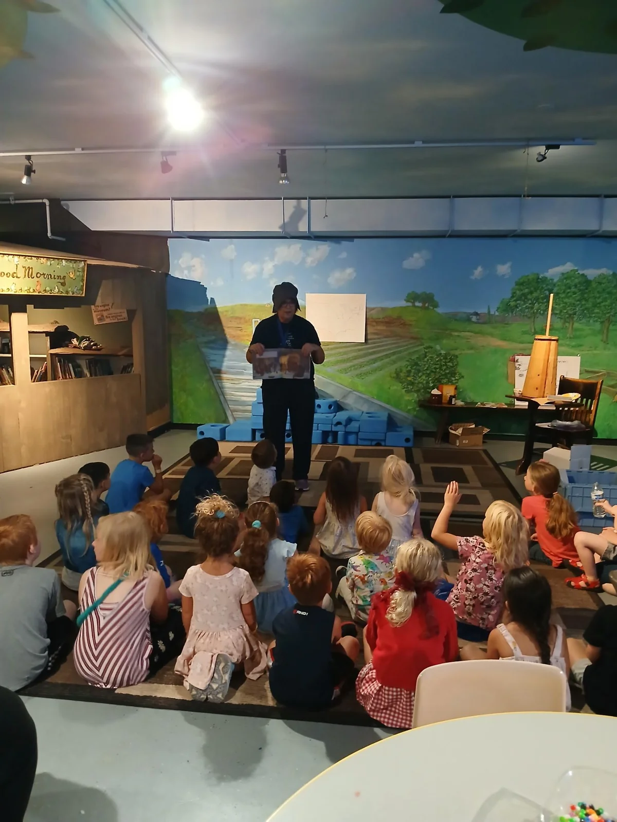 Children gathered for a classroom reading activity
