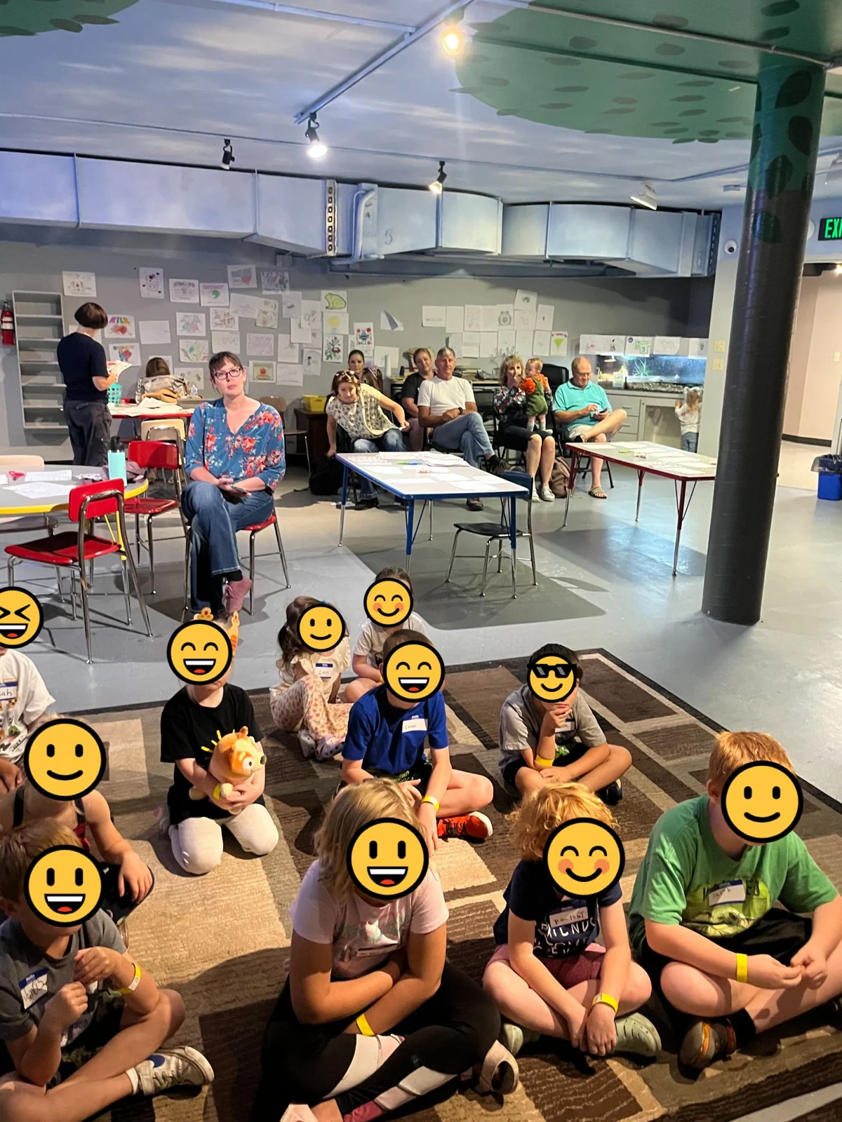 Children wearing animal masks in a classroom
